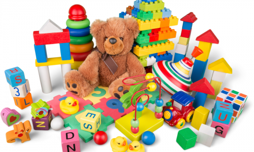 toys and a bear in a bright area